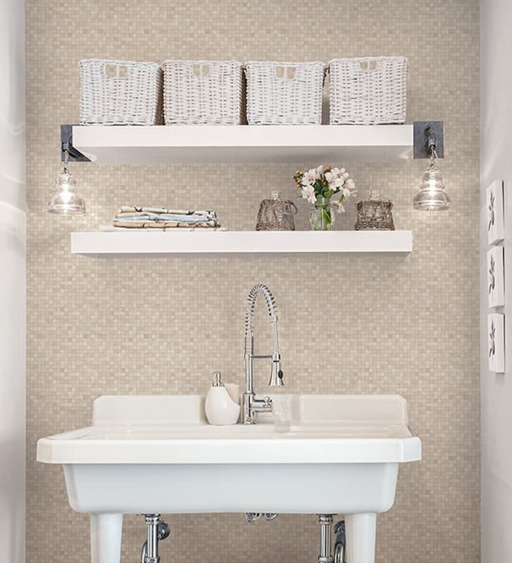 Taupe Tessera mosiac tiles wallcovering in a bathroom

24 May 2013 --- Wide white sink in bathroom --- Image by © Hero Images/Corbis